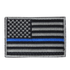 The Condor US Flag Patch features a black and white American flag with a single blue stripe across the center, honoring First Responder service and dedication.