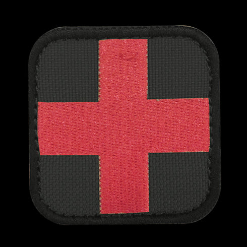 The Condor Medic Patch features a square design with a red cross centered on a black background and bordered by a black edge—ideal for military or first responder use.