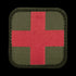 The Condor Medic Patch is a fabric military patch with a red cross on an olive green background and rounded black edges—ideal for bushcraft or use at the shooting range.