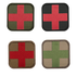 The Condor Medic Patch set includes four square patches for EDC: three display red crosses on green or tan, and one shows a green cross on tan/brown—ideal for First Responders and Law Enforcement professionals.