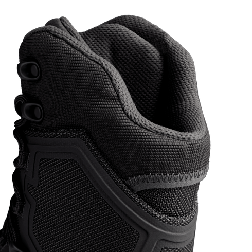 Close-up view of the upper portion of Condor Brigade 8" Tactical Boots in black, highlighting the textured fabric, stitching, and lace eyelets against a plain background.