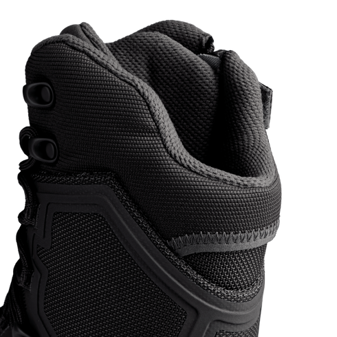 Close-up of the upper section of the Condor Brigade 8" Tactical Boots - Zip (Black), highlighting textured fabric, stitching, and lace eyelets against a white background.