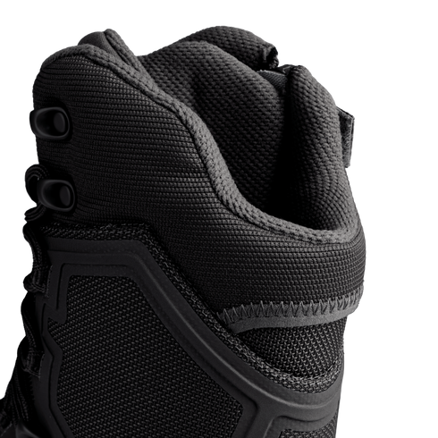 Close-up of the upper section of Condor Brigade 8" Tactical Boots - Zip (Black), highlighting textured fabric, stitching details, and lace eyelets against a white background.