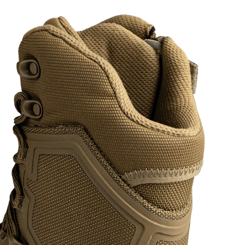 Close-up of the upper part of the Condor Brigade 8" Tactical Boots - Zip (Coyote Brown), highlighting textured fabric, lacing eyelets, and reinforced stitching.