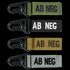 Condor Blood Type Key Chain set: four keychains with black clasps and AB NEG fabric tags in green, black, tan, and gray.