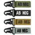 Condor Blood Type Key Chain set: four keychains with black clasps and AB NEG fabric tags in green, black, tan, and gray.
