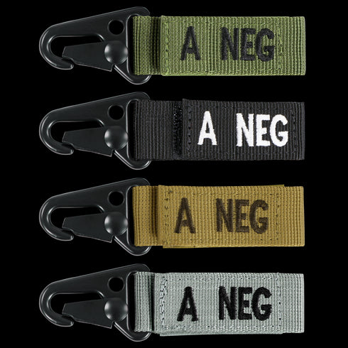 Condor Blood Type Key Chain: four metal-clip, fabric-strap keychains labeled A NEG in green, black, tan, and gray.