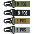 The Condor Blood Type Key Chain set features four keychains with plastic clips and fabric tags labeled B POS, available in green, black, tan, and gray.
