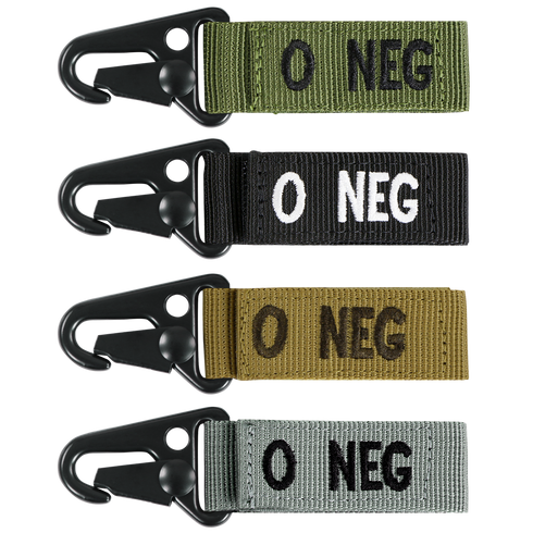 The Condor Blood Type Key Chain set includes four fabric keychains with metal clips, each labeled O NEG in green, black, tan, and gray to indicate O negative blood type.