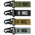 The Condor Blood Type Key Chain set includes four fabric keychains with metal clips, each labeled O NEG in green, black, tan, and gray to indicate O negative blood type.