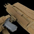 The Condor Battle Belt Gen II in tan, featuring detailed stitching, buckles, and Velcro attachments, is shown with a training pistol inserted.