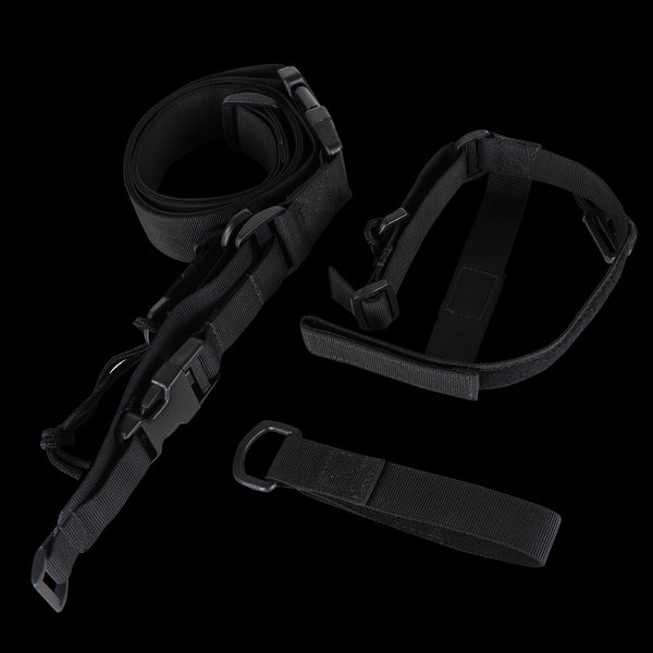 The Condor 3-Point Sling, a black adjustable nylon strap with plastic buckles and metal rings, is ideal for bushcraft or first responder use and is shown laid out on a white background.