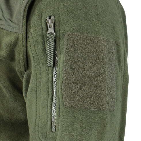 Close-up of the Alpha Fleece Jacket by Condor, featuring a green sleeve with a zippered pocket, pull tab, and rectangular loop fabric patch for attaching patches.