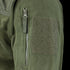 Close-up of the Alpha Fleece Jacket by Condor, featuring a green sleeve with a zippered pocket, pull tab, and rectangular loop fabric patch for attaching patches.