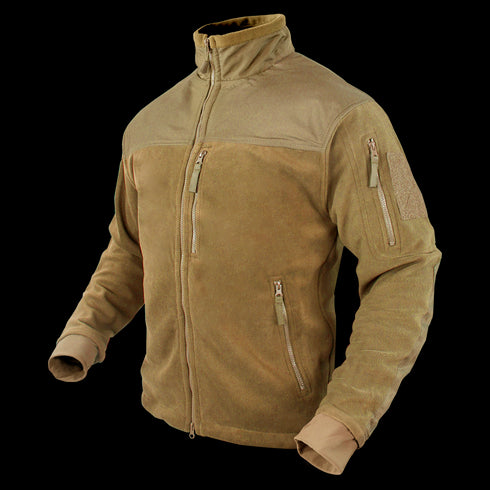 The Condor Alpha Fleece Jacket in tan features multiple zippered pockets and a high collar, shown against a plain background.
