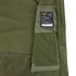 Close-up of the olive green Summit Softshell Jacket by Condor, featuring a tactical hood, zippered pocket, and a label with washing instructions and Condor branding.