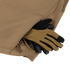 A pair of brown and black work gloves with thermal insulation are partially tucked into the zippered pocket of a tan Condor Summit Softshell Jacket.