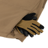 A pair of brown and black work gloves with thermal insulation are partially tucked into the zippered pocket of a tan Condor Summit Softshell Jacket.
