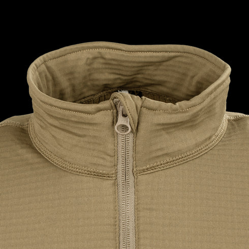 Close-up of the Condor Base II Zip Pullover, a tan, ribbed half-zip jacket featuring a high collar and visible stitching.