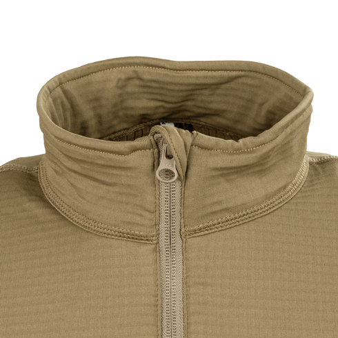 Close-up of the Condor Base II Zip Pullover, a tan, ribbed half-zip jacket featuring a high collar and visible stitching.