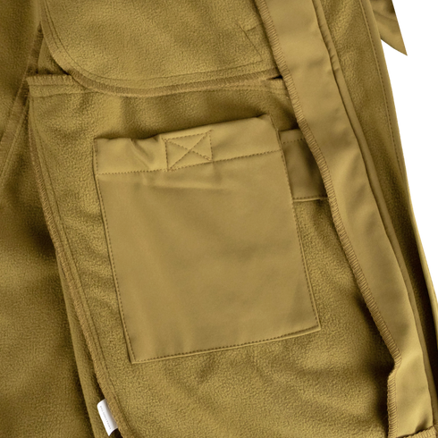 Close-up of the Condor Phantom Softshell Jacket in tan, showing a rectangular fabric pocket with visible stitching and a belt loop on the right side.