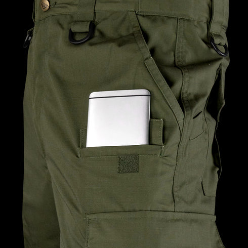 A silver smartphone partially visible in the side pocket of Condor Sentinel Tactical Pants.
