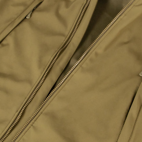 Close-up of the Condor Summit Zero Softshell Jacket in brown, featuring a visible zipper and detailed fabric texture.