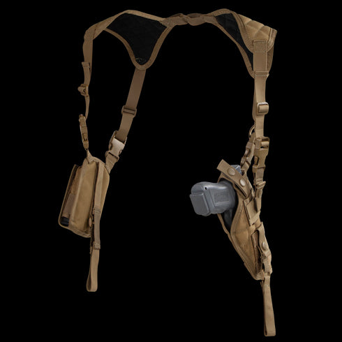 The Condor Vertical Shoulder Holster features padded tan straps, a holster for your handgun on one side, and an accessory pouch on the other.