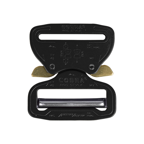 The Austrialpin Cobra Buckle - Pro Style features a black and gold metal quick-release design with engraved instructions—ideal for bushcraft adventures or law enforcement gear.
