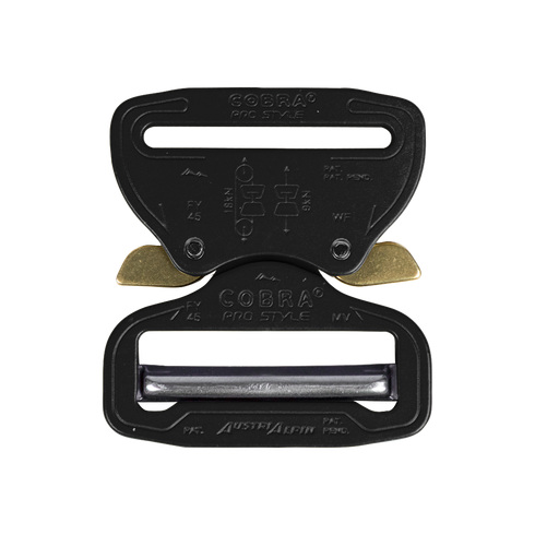 The Austrialpin Cobra Buckle - Pro Style features a black and gold metal quick-release design with engraved instructions—ideal for bushcraft adventures or law enforcement gear.