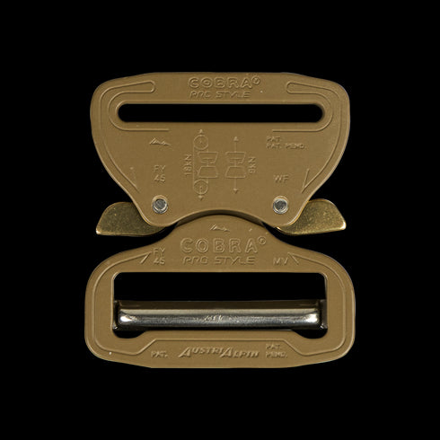 The Austrialpin Cobra Buckle - Pro Style is shown in tan metal, closed with engraved text, labels, and a central release mechanism—perfect for EDC or First Responder gear.