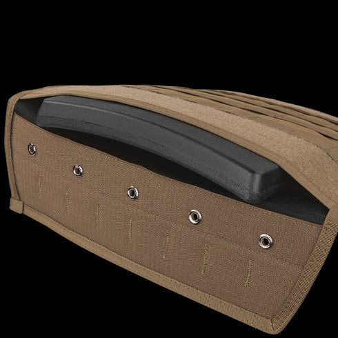 Close-up of a Condor Compact Plate Carrier pocket partially open, revealing a black ballistic armor plate inside—perfect tactical gear for military or law enforcement professionals.