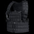 The Condor Modular Chest Set is a black tactical vest with adjustable shoulder straps, front buckles, and multiple webbing loops for attaching bushcraft or EDC gear.