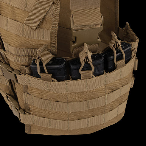 The Condor Modular Chest Set is a tan tactical vest with MOLLE webbing, perfect for military or shooting range use, and holds multiple black rifle magazines in its front pouch.