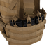 The Condor Modular Chest Set is a tan tactical vest with MOLLE webbing, perfect for military or shooting range use, and holds multiple black rifle magazines in its front pouch.