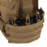The Condor Modular Chest Set is a tan tactical vest with MOLLE webbing, perfect for military or shooting range use, and holds multiple black rifle magazines in its front pouch.