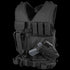 The Condor Cross Draw Vest is a black tactical vest featuring multiple pockets, a holstered handgun, and gear attachments, designed for first responders or law enforcement professionals.