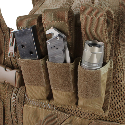 The Condor Cross Draw Vest features three pouches for carrying a magazine, a folding knife, and a flashlight.