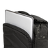 A silver laptop is partially tucked into the front compartment of the Condor Prime Pack 21L - MultiCam Black backpack.