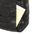A yellow legal pad is partially visible in the front pocket of a Condor Prime Pack 21L backpack in MultiCam Black.