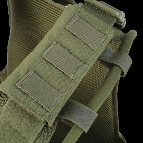 Close-up of the Condor Defender Plate Carriers olive green shoulder strap, featuring reinforced stitching and multiple attachment loops.