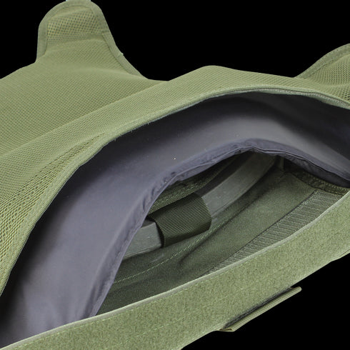 Close-up of an open Condor Defender Plate Carrier in olive green, displaying the interior compartment with a visible armor plate inside.