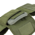 A close-up of the Condor Defender Plate Carrier in green, featuring an open pocket that reveals a ballistic plate inside.