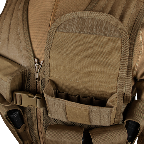 Close-up of the Condor Elite Tactical Vest in tan, featuring multiple pockets, a large front pouch, small EDC loops, and compartments—ideal for bushcraft or shooting range use.
