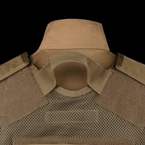 Close-up of the back of the Condor Elite Tactical Vest, featuring mesh fabric, padded shoulder straps, and a reinforced drag handle—ideal for law enforcement or bushcraft use.
