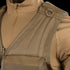 Close-up of a person wearing the Condor Elite Tactical Vest over a matching zippered uniform, highlighting sturdy shoulder straps and a metal D-ring—ideal for law enforcement or EDC use.
