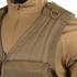 Close-up of a person wearing the Condor Elite Tactical Vest over a matching zippered uniform, highlighting sturdy shoulder straps and a metal D-ring—ideal for law enforcement or EDC use.