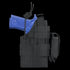 A Condor Ambidextrous Holster - 1911, black, holds a blue training pistol and features retention straps plus multiple utility pouches.