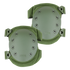 A pair of Condor Knee Pads 2 in green with hard protective shells and adjustable straps.
