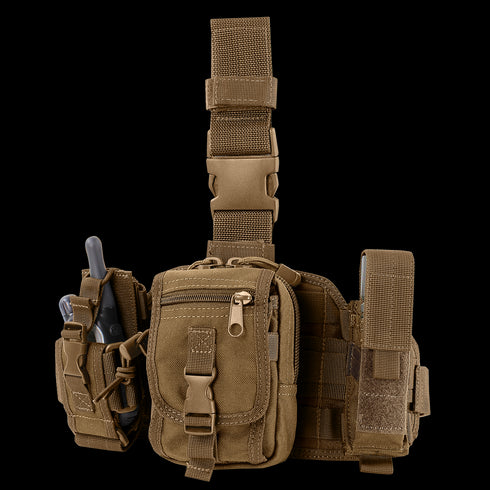 The Condor Utility Leg Rig is a tactical khaki pouch with multiple compartments and buckle closures, perfect for EDC or shooting range use. Attach gear like a walkie-talkie or pliers to its strap for quick access.